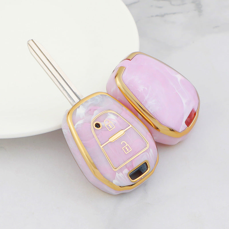 Isuzu Autoschlüsseletui, goldfarben mit Jade-Einlage