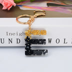 Carsine Black Pompom 26 Alphabets Keychain gold / E